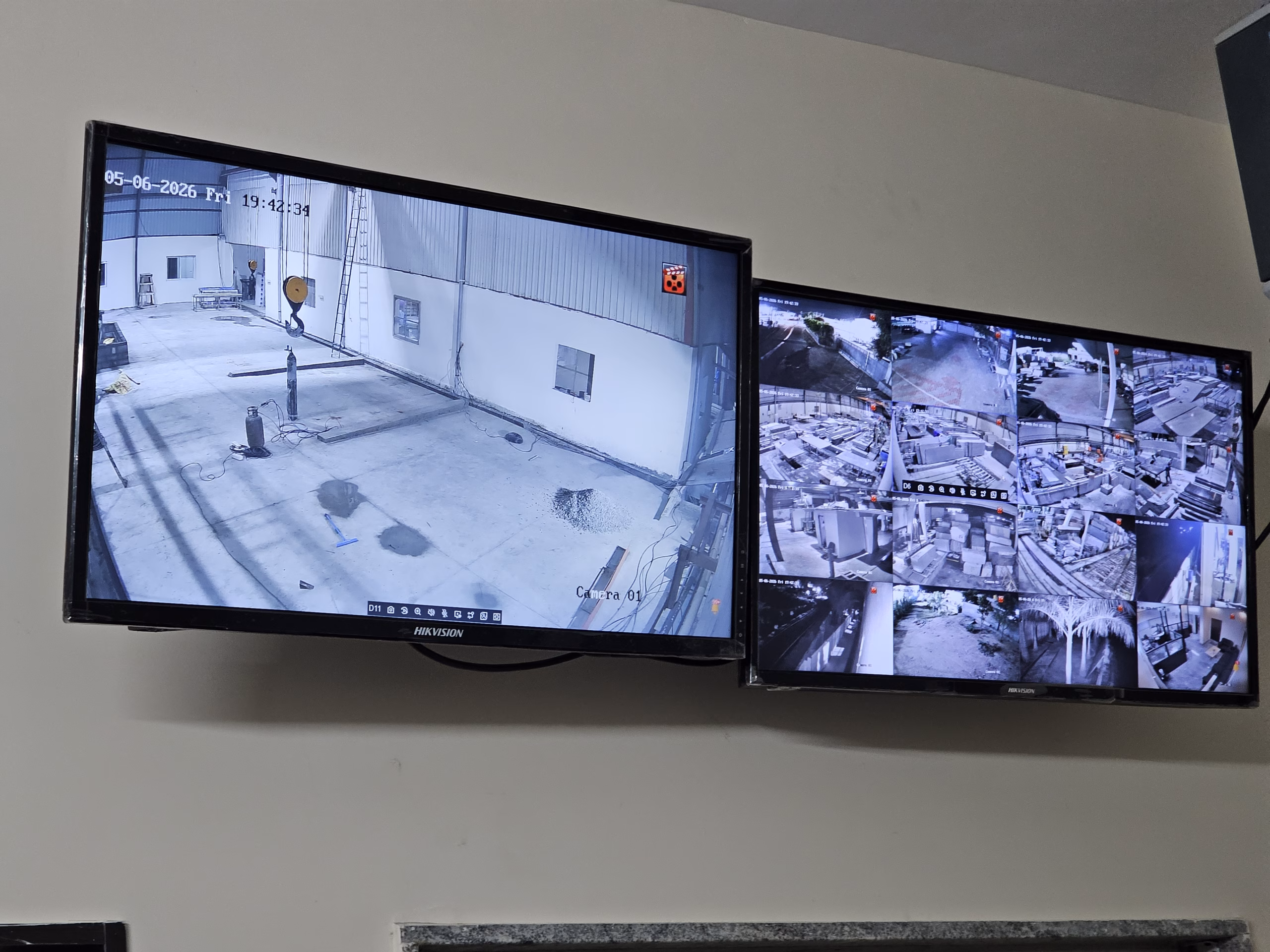 Dual Hikvision monitor wall — control room