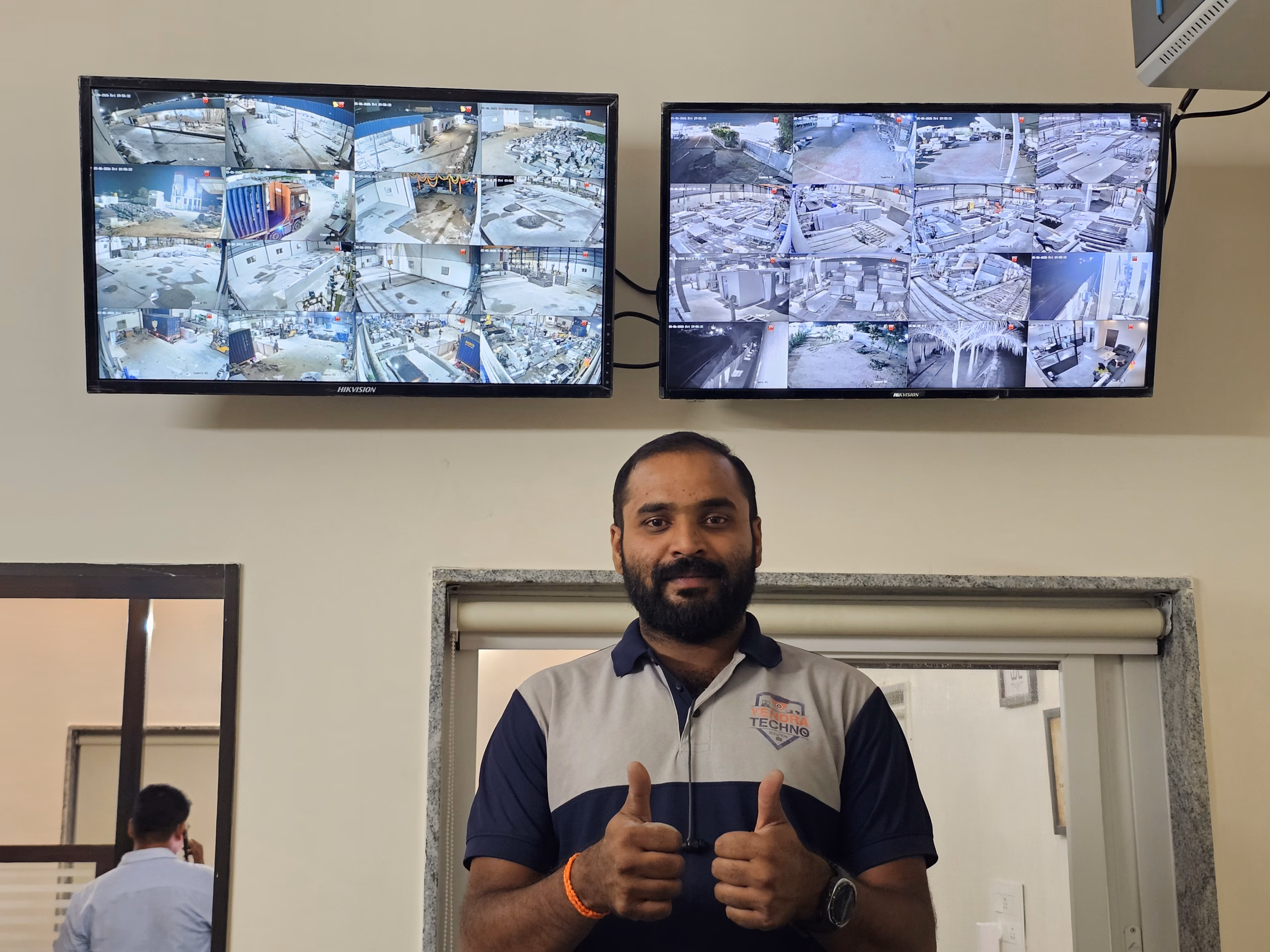 Yendra team with completed monitor wall installation
