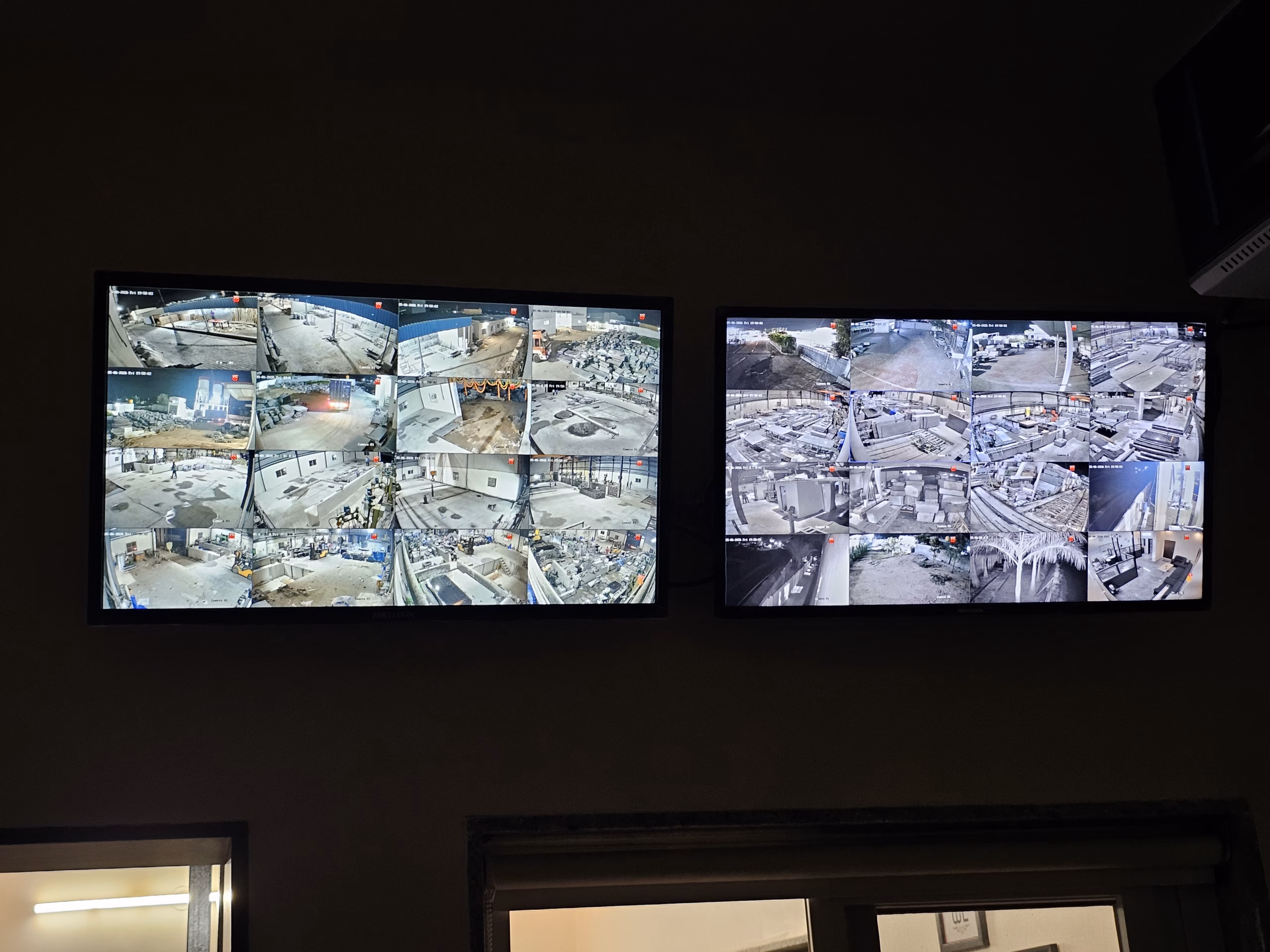 Night view of monitor wall showing all camera feeds